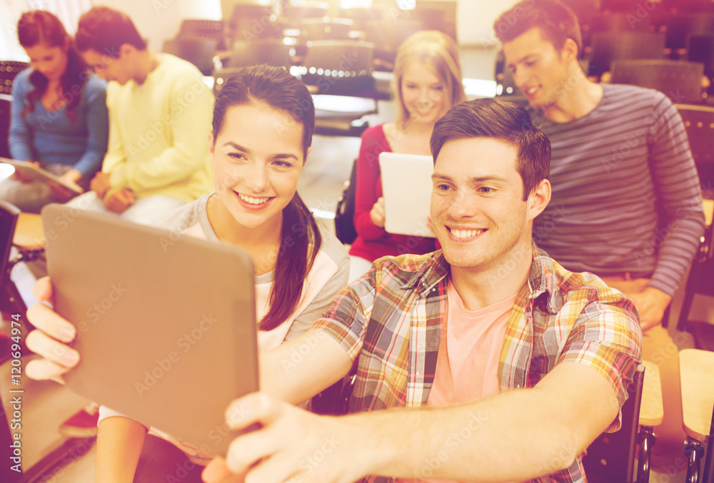 group of smiling students with tablet pc group of smiling students with tablet pc