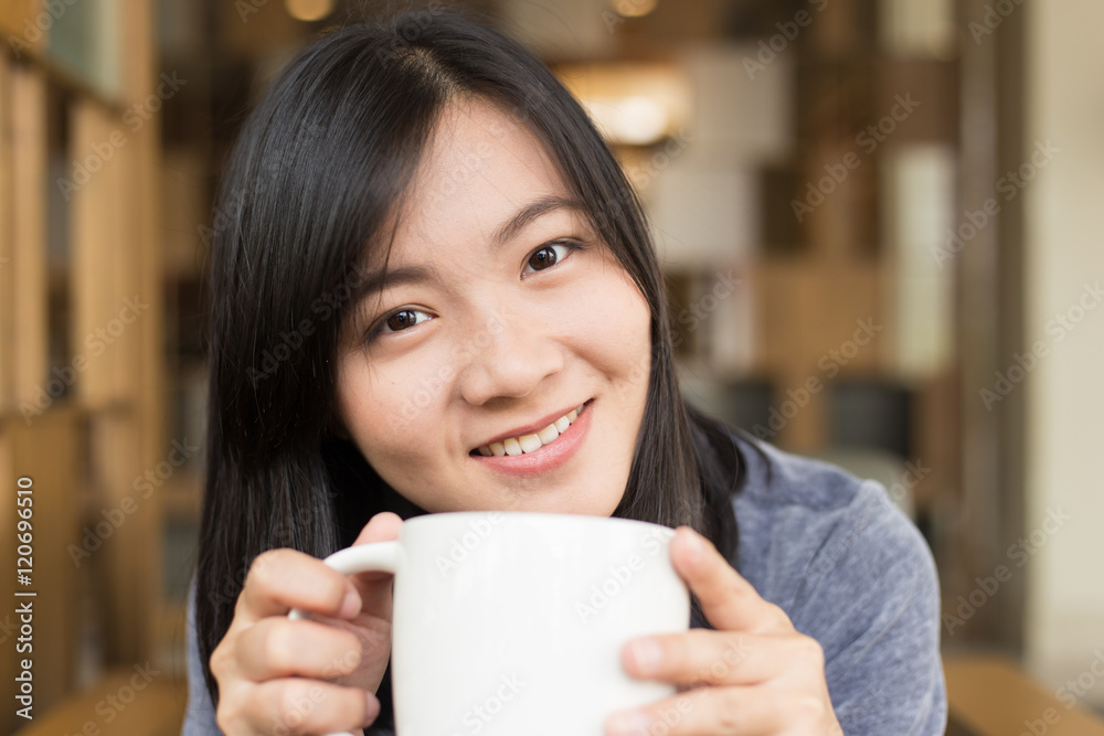 Woman drinking coffee in the morning at cafe Woman drinking coffee in the morning at cafe