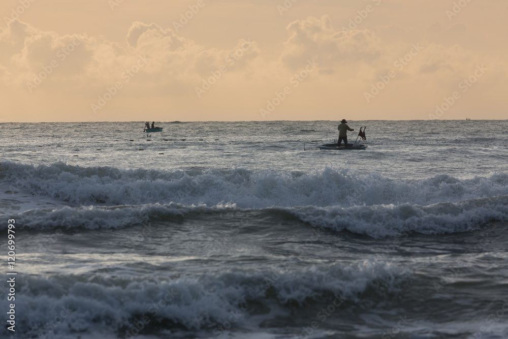 Fototapeta premium fishing coracles on sea, tribal boats at fishing village