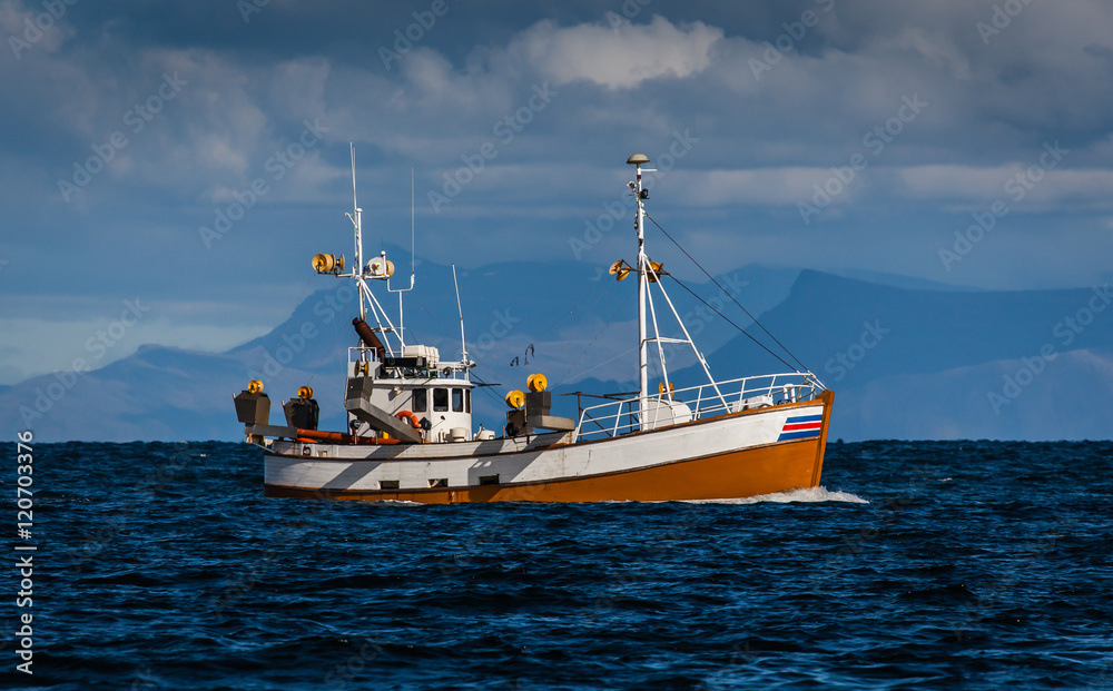 Old fishing boat on mackerel fishing near the southwest coast of Iceland.