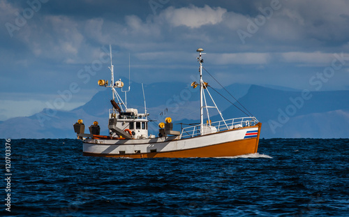 Old fishing boat on mackerel fishing near the southwest coast of Iceland.