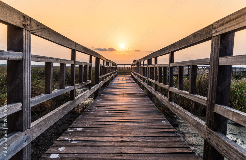 Wood bridge in sunset time at Sam Roi Yot National Park, Thailand