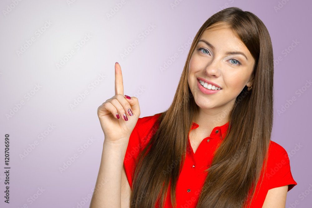 smiling young woman pointing smiling young woman pointing