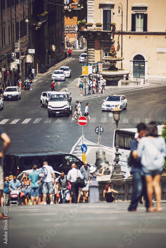 ROME, ITALY - JULY 14 2016: Beautiful street view with toutists, photo