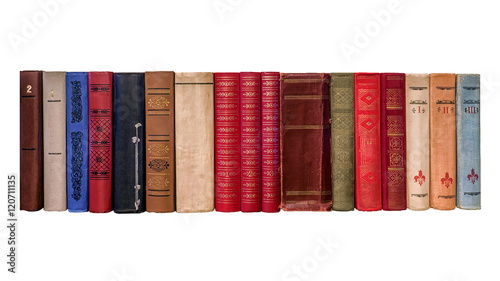 Obraz na płótnie spines of old books on a white background w salonie