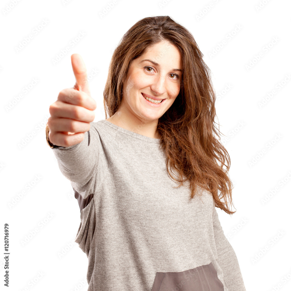 Young curvy woman with thumb up gesture over white Young curvy woman with thumb up gesture over white