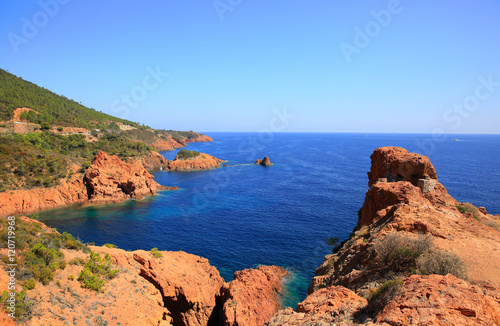 Esterel mediterranean red rocks coast, beach and sea. French Riviera in Cote d Azur near Cannes Saint Raphael, Provence, France, Europe
