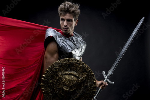 Tableau sur toile Gladiator, centurion or Roman warrior with iron armor, military