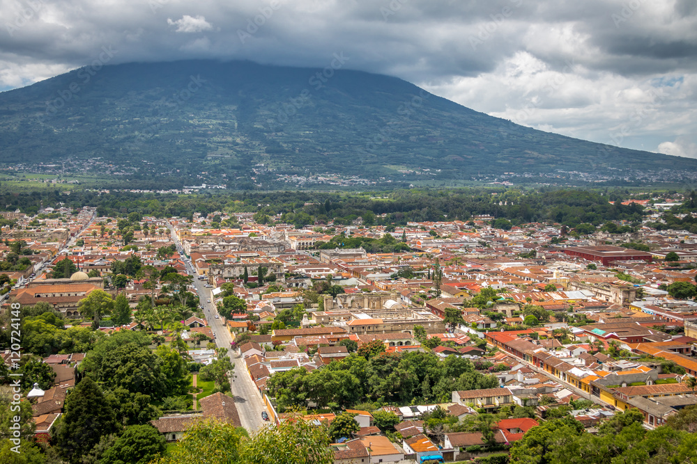 City view of Antigua Guatemala from Cerro de La Cruz with Agua Volcano in the background
