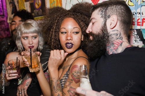 Friends hanging out at a bar