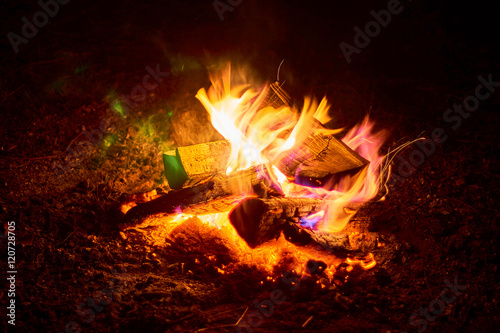 Beautiful night bonfire over Lemiet lake in Mazury district, Poland. Fantastic travel destination.