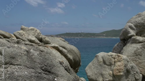 Zoom out from the sea to coast and blowholes in Albany, Western Australia photo