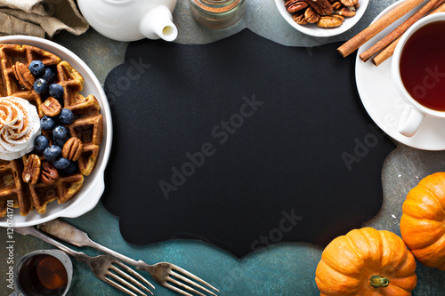 Pumpkin waffles with whipped cream for breakfast © fahrwasser