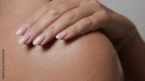 Wallpaper Mural Female in slow motion applying body lotion on tanned back close-up 1920X1080 HD footage - Sensual Caucasian woman moisturization of skin slow-mo 1080p FullHD video  Torontodigital.ca