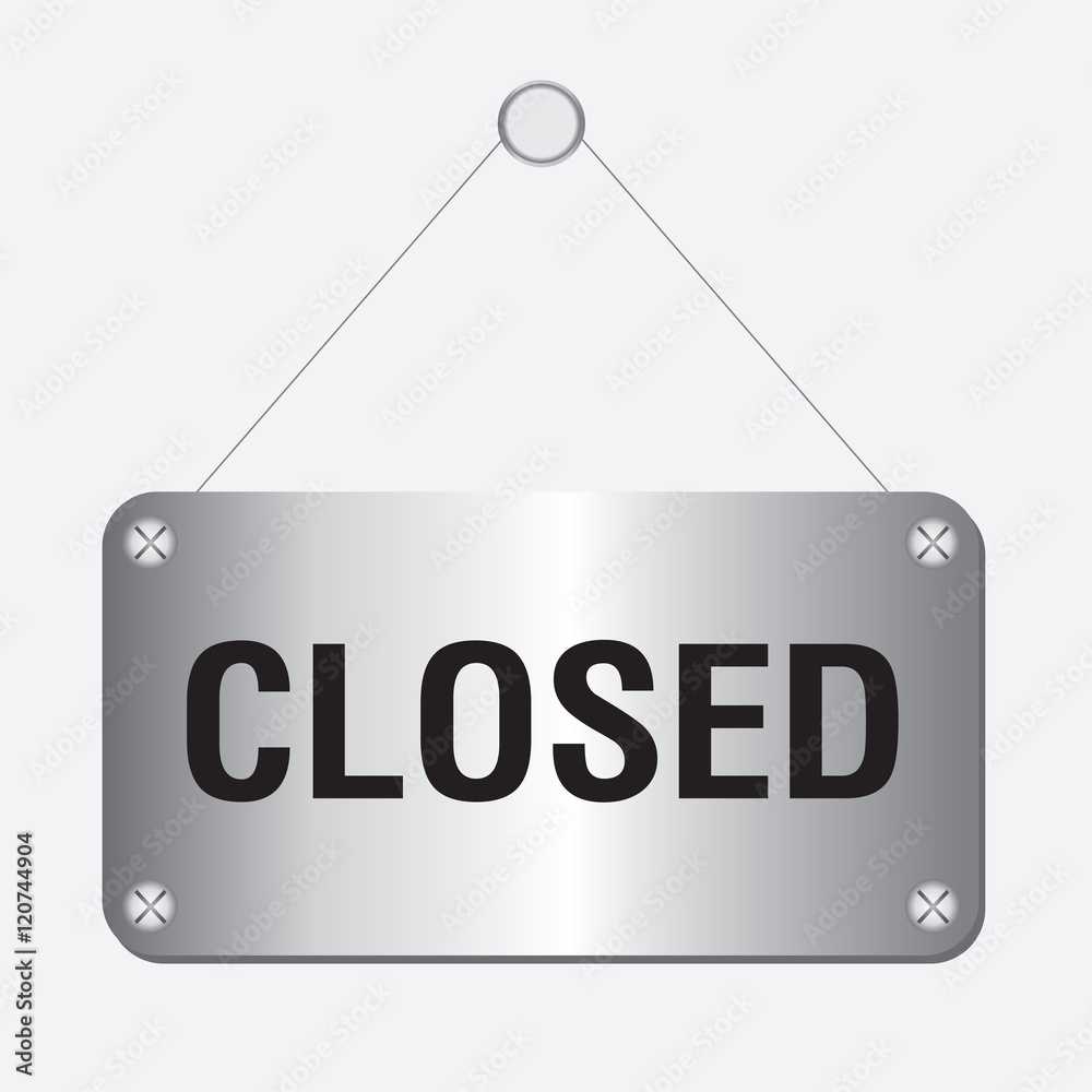 silver metallic closed sign hanging on the wall silver metallic closed sign hanging on the wall