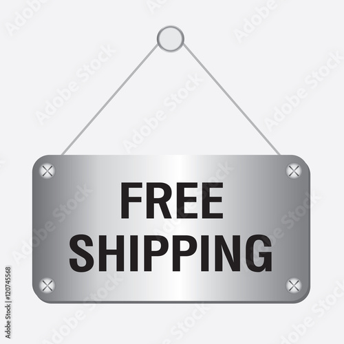 silver metallic free shipping sign hanging on the wall 