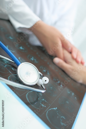Doctor consolating patient diagnosed with an incurable disease
