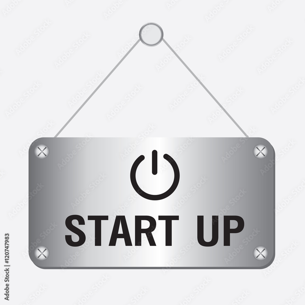 silver metallic start up sign hanging on the wall silver metallic start up sign hanging on the wall