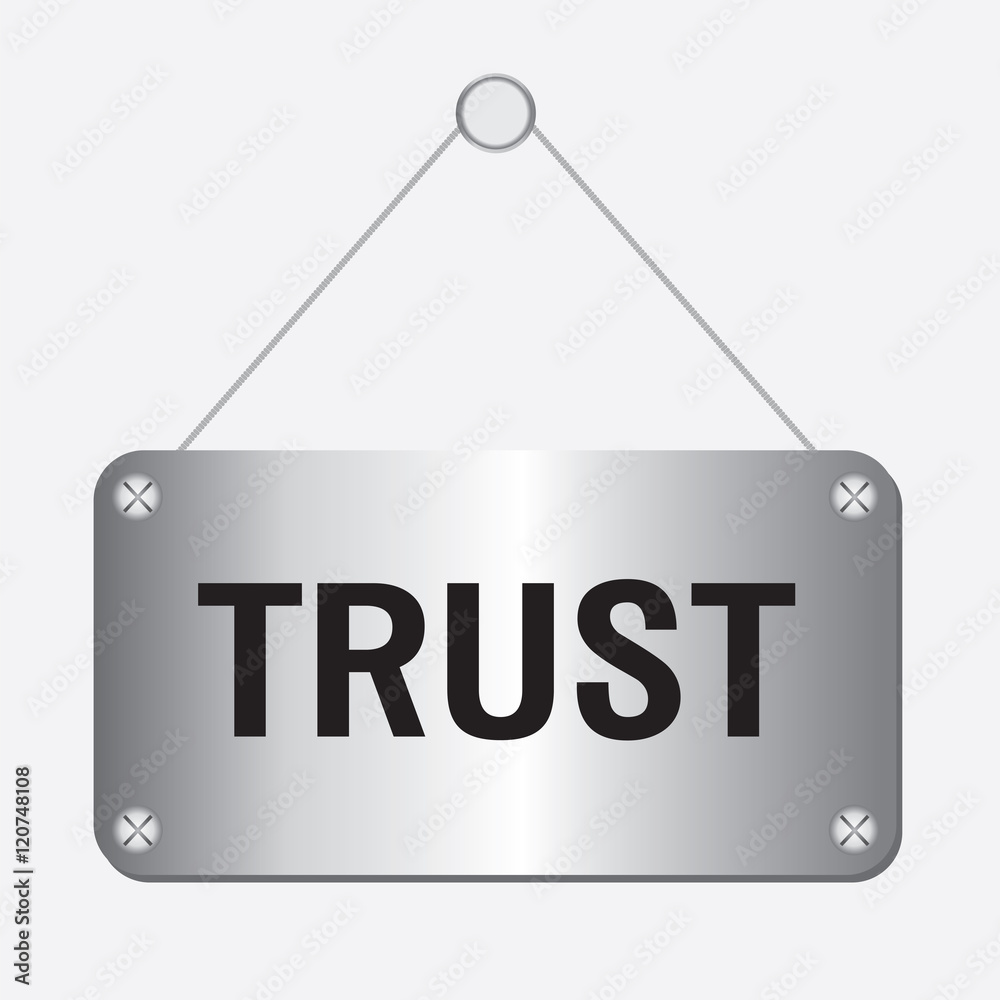 silver metallic trust sign hanging on the wall silver metallic trust sign hanging on the wall