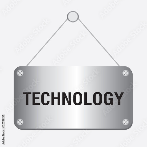 silver metallic technology sign hanging on the wall 