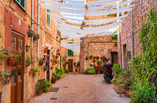 Beautiful street with flowers in Valldemossa Majorca Spain