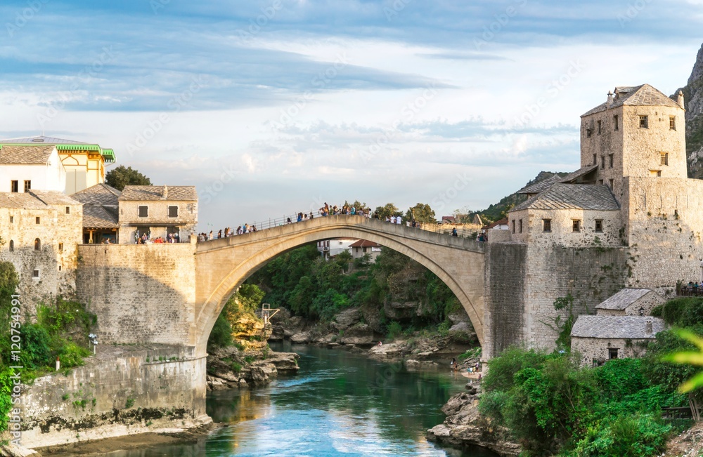 Old bridge over Neretva river in sunset, Mostar, Bosnia and Herzegovina Old bridge over Neretva river in sunset, Mostar, Bosnia and Herzegovina