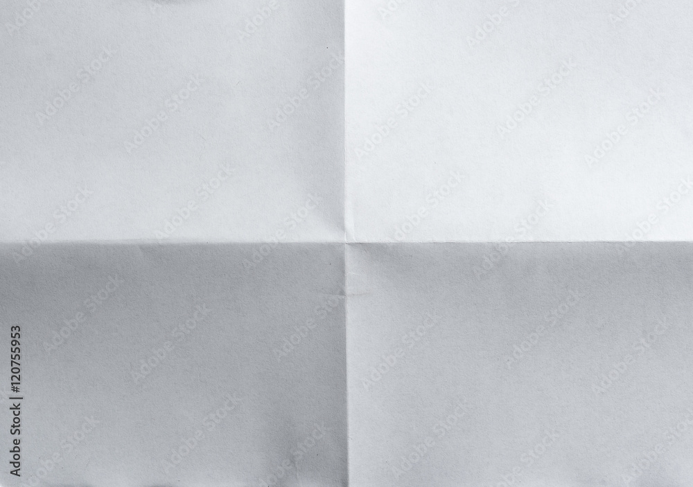 Sheet of paper folded in four Sheet of paper folded in four