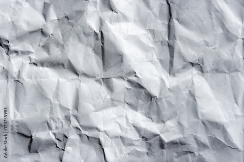 Crumpled paper isolated on a black background.