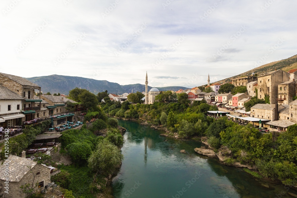 Evening scene in Mostar with the medieval town, the Neretva river in Bosnia Herzegovina