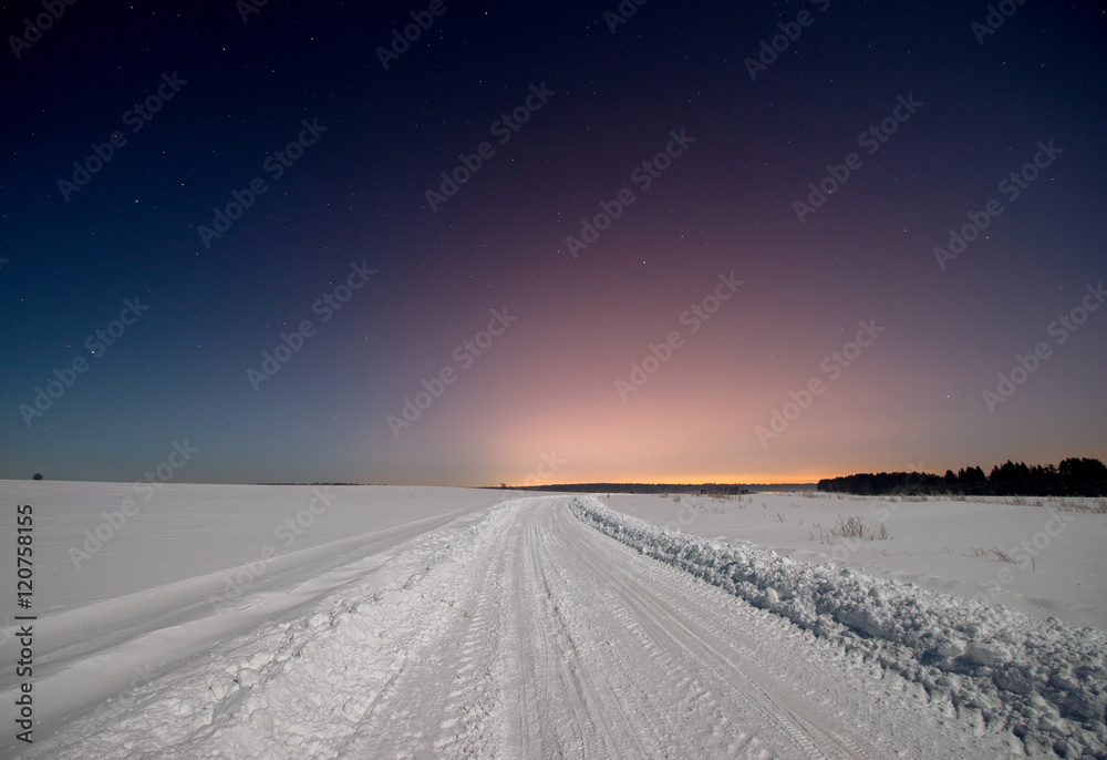 road in winter snowy night