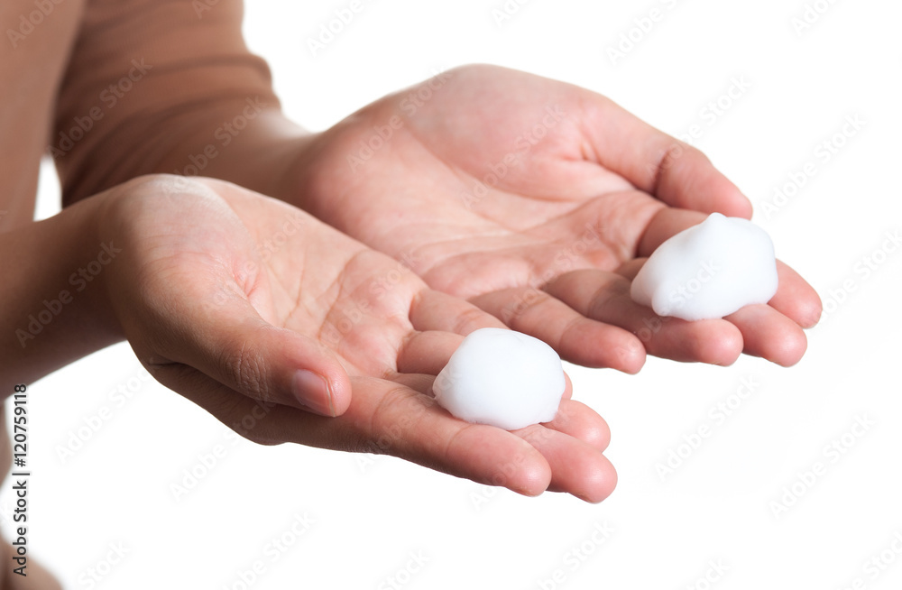 Shave foam (cream) on woman's hands Shave foam (cream) on woman's hands