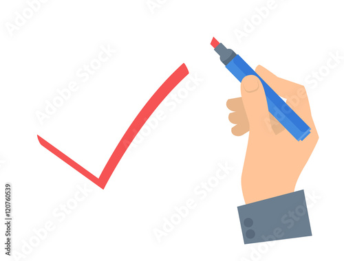 Human hand write check sign on a voting paper.