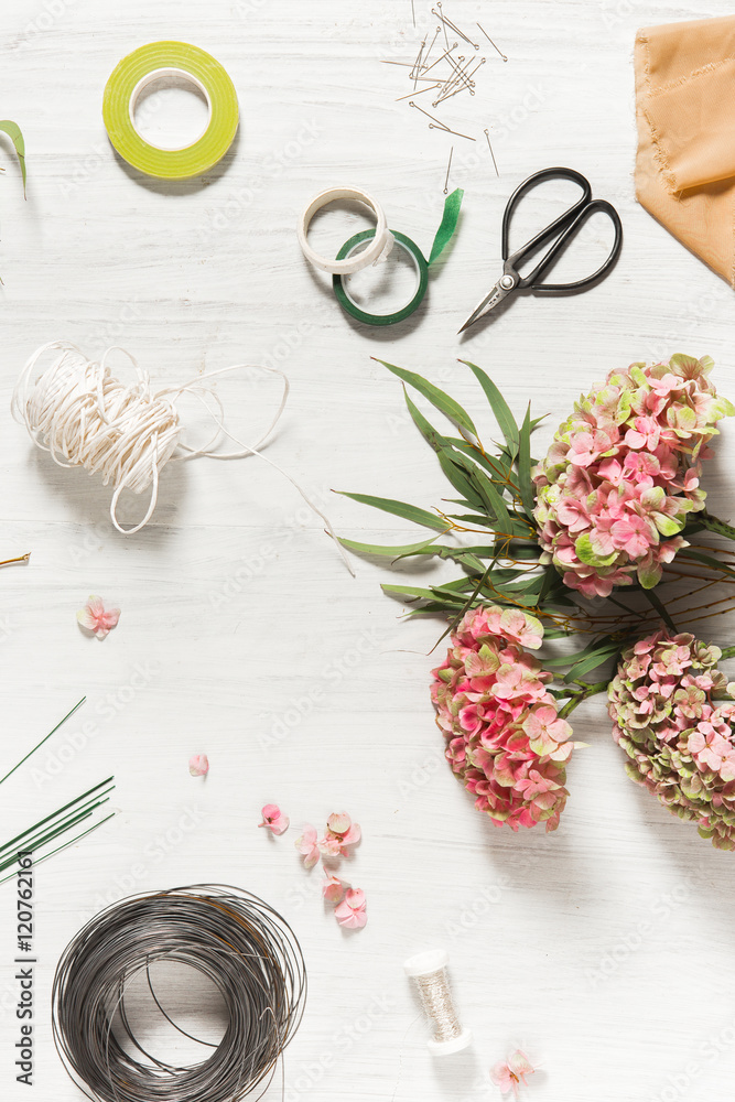 The florist desktop with working tools The florist desktop with working tools