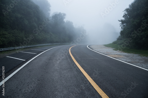 The long road through the mist on the mountains.