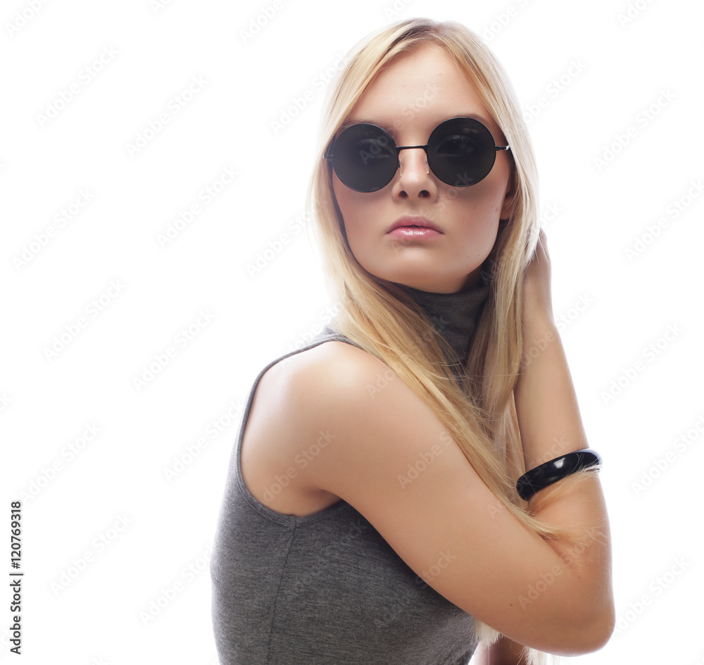 Beauty stylish blonde woman posing in fashionable clothes and bi Beauty stylish blonde woman posing in fashionable clothes and bi