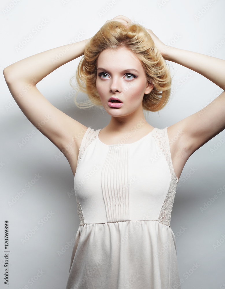 young magnificent woman in white dress.