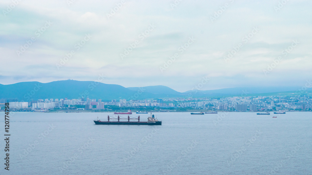 Tsemes bay and ships in roadstead near the commercial port of Novorossiysk, Russia Tsemes bay and ships in roadstead near the commercial port of Novorossiysk, Russia