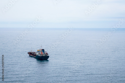 Ship in roadstead near the commercial port of Novorossiysk, Russia