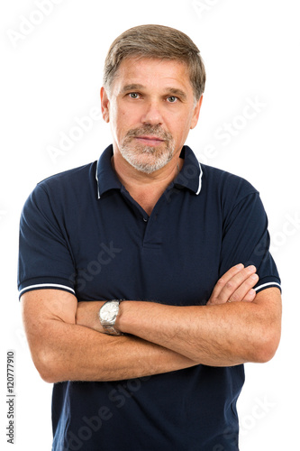 Portrait of serious adult man on a white background © pavelkriuchkov
