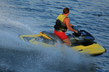 Acrylglasbilder Wasser Motorsport Wassermotorrad auf blauem Meer  © AlexZlat