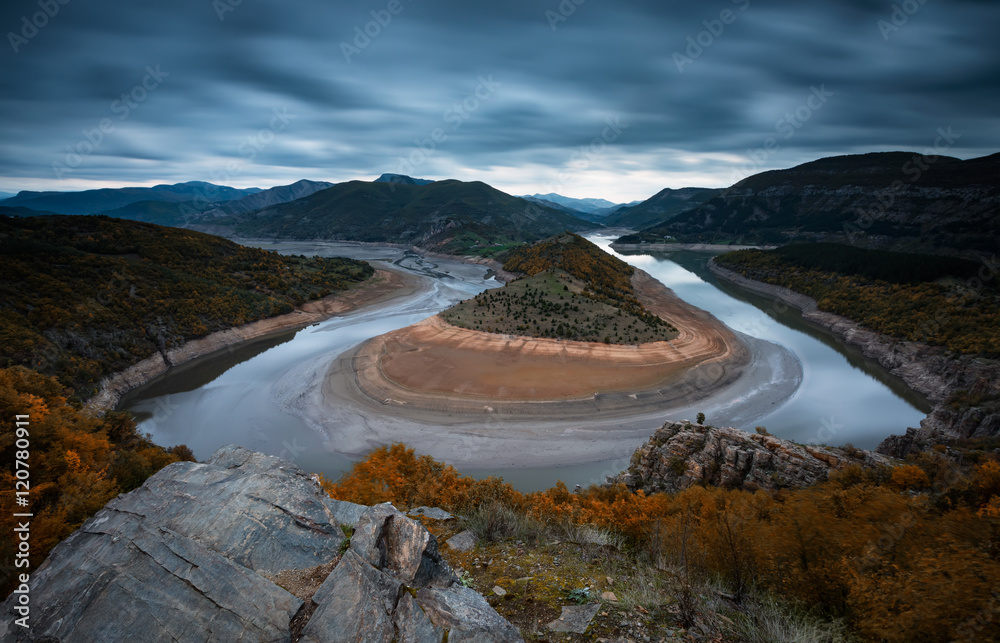 The big turn / 
Panoramic view in the blue hour of meanders of Arda river near Kardzhali, Bulgaria