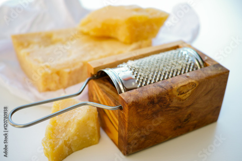 Parmesan cheese. Grated Parmesan cheese. Olive Wood Parmesan Che