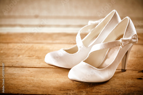 Pair of White Satin Bridal Shoes with Bows