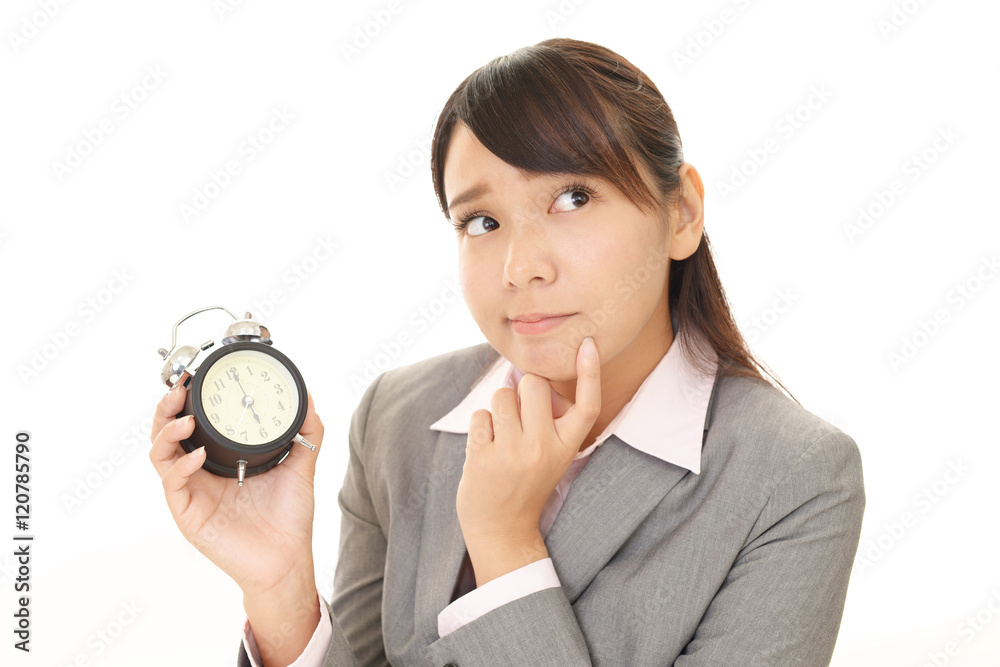 時計を持つビジネスウーマン 時計を持つビジネスウーマン