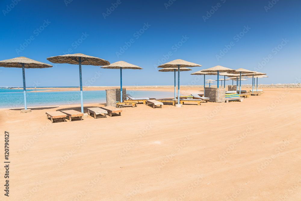 Fototapeta premium Sunshade umbrellas on the beach
