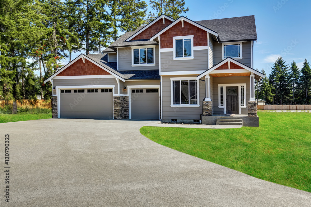 Craftsman American house with rocks trim, garage and concrete floor porch Craftsman American house with rocks trim, garage and concrete floor porch