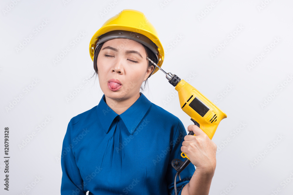 Young builder woman with a drill Young builder woman with a drill