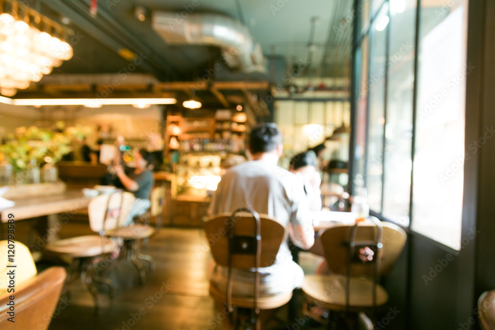 People in Coffee shop blurred background with bokeh light People in Coffee shop blurred background with bokeh light