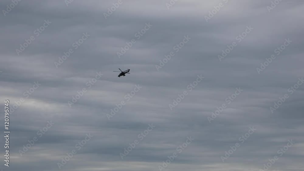 Exhibition Army 2016 in Russia. Showing Modern Weapons.helicopter in the Air and Opens Fire Missiles at the Target Exhibition Army 2016 in Russia. Showing Modern Weapons.helicopter in the Air and Opens Fire Missiles at the Target