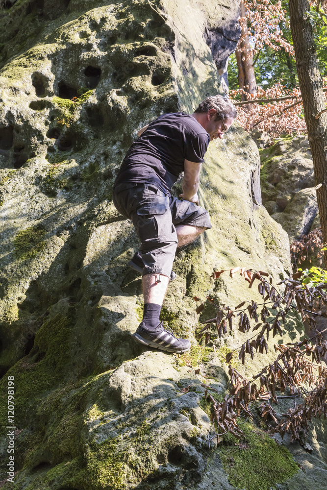 free climber in Saxon Switzerland, Germany